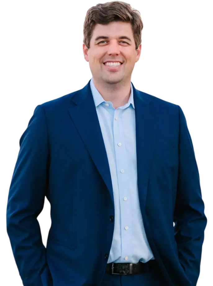 Peter S. Buas in a professional suit, smiling confidently, representing legal expertise in Maryland tax sale foreclosures.